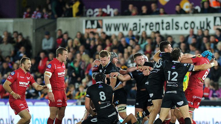 Tempers flair between the two sides at the Liberty Stadium